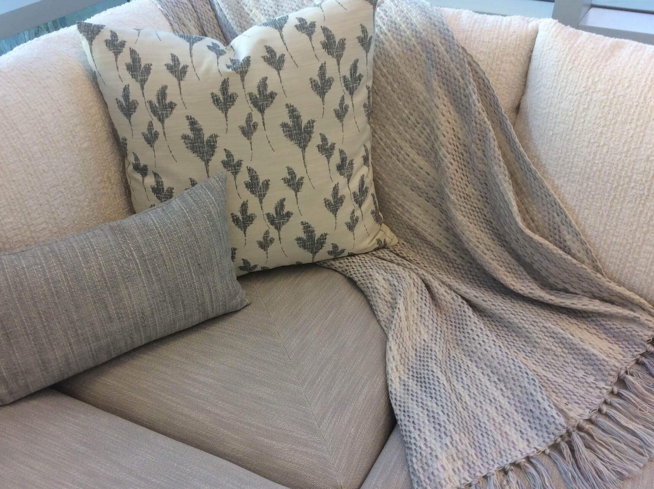 Mitered cushion and contrasting pillows